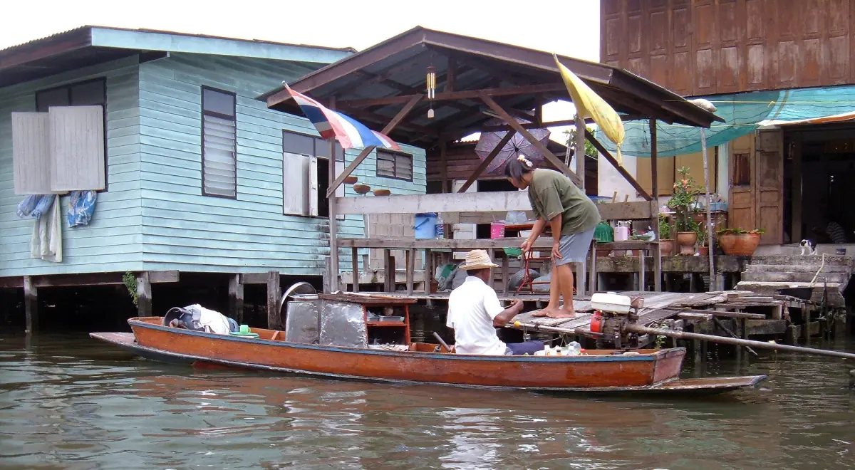A boat vendor on a canal in Bangkok