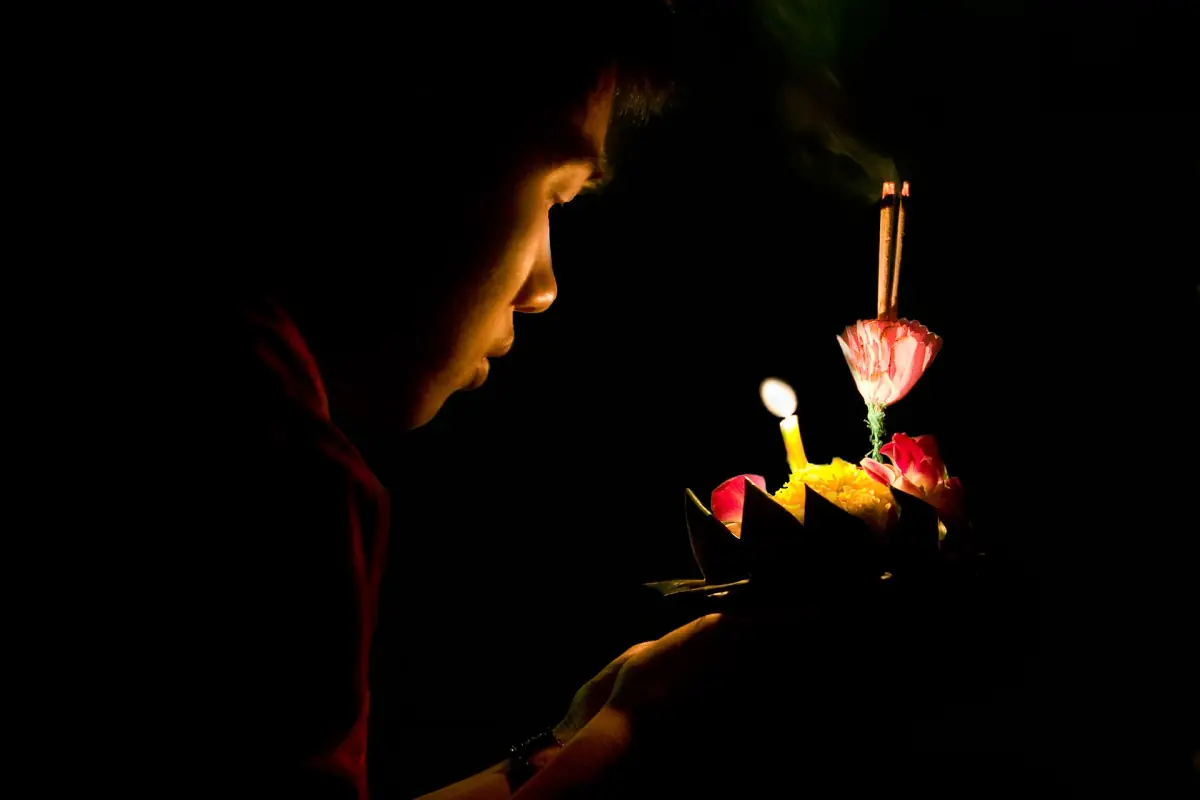 A krathong with candles at Loy Krathong
