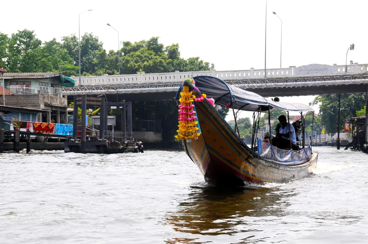 Long-tail boat on a canal in Thonburi