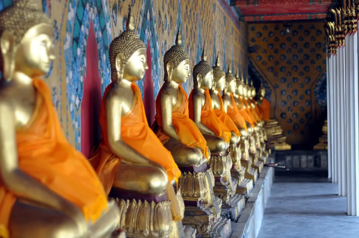 Row of Buddha statues inside Wat Arun