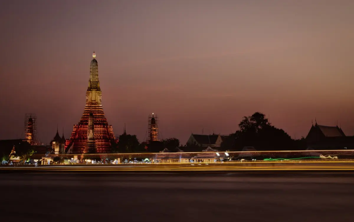 Wat Arun at dusk from across the Chao Phraya