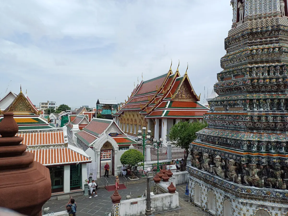 A secondary prang and temple buildings at Wat Arun
